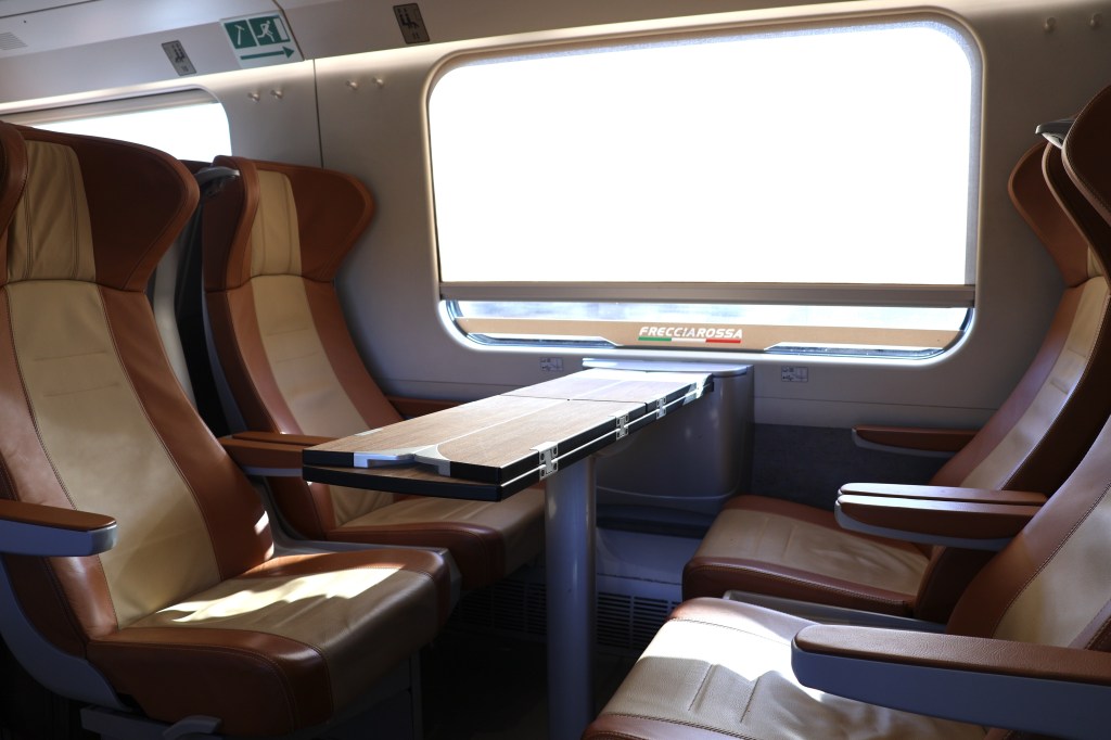 Four-seater with extendable table in business class (coach 2) on the Frecciarossa ETR 600 high-speed train, 6 July 2024